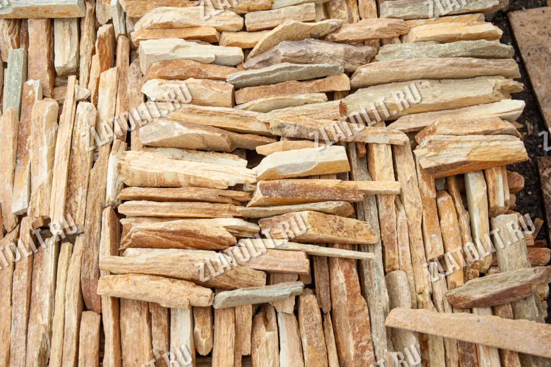 горбушка из жёлтого златолита для облицовки в наличии от производителя